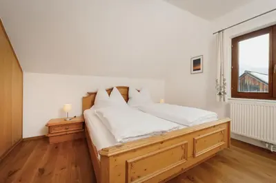 Ein Bett oder Betten in einem Zimmer der Unterkunft Haus Grundlsee