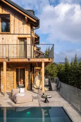 Der Swimmingpool an oder in der Nähe von Luxus AlmChalets Schladming-Dachstein