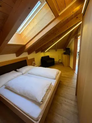 Ein Bett oder Betten in einem Zimmer der Unterkunft Nebenhaus - Haus Heigl
