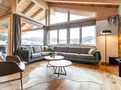 Ein Sitzbereich in der Unterkunft Grebenzen Lodge 35