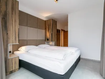 Ein Bett oder Betten in einem Zimmer der Unterkunft Grebenzen Lodge 35