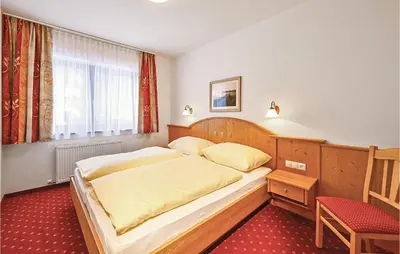 Ein Bett oder Betten in einem Zimmer der Unterkunft Ferienwohnung In Flachau