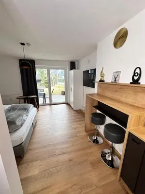 Ein Bett oder Betten in einem Zimmer der Unterkunft Grimming Lodge Tauplitz