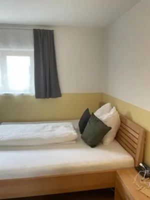 Ein Bett oder Betten in einem Zimmer der Unterkunft 1 Zimmer Appartement nahe Gmunden Top2