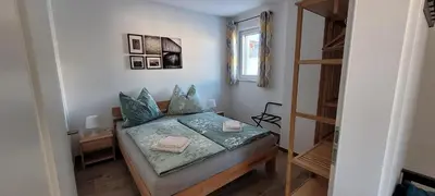 Ein Bett oder Betten in einem Zimmer der Unterkunft Appartement Petersberg