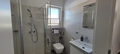 Ein Badezimmer in der Unterkunft Appartement Petersberg