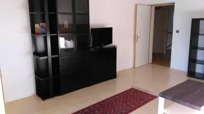Küche/Küchenzeile in der Unterkunft Rooming Green mit Seeblick