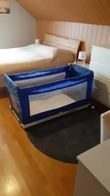 Ein Bett oder Betten in einem Zimmer der Unterkunft Rooming Green mit Seeblick