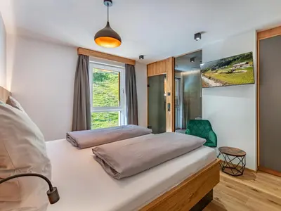 Ein Bett oder Betten in einem Zimmer der Unterkunft Apartment Kleiner Kessel by Interhome