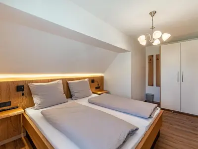 Ein Bett oder Betten in einem Zimmer der Unterkunft Apartment Karlspitz by Interhome