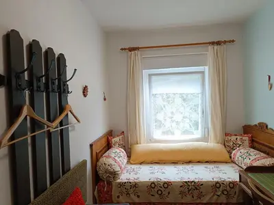 Ein Bett oder Betten in einem Zimmer der Unterkunft Ferienwohnungen Landhaus Gerum