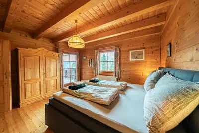 Ein Bett oder Betten in einem Zimmer der Unterkunft Haus Matteo - Familienurlaub beim Ödensee