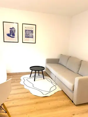 Ein Sitzbereich in der Unterkunft Zentrale Wohnung mit Alpenblick