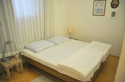 Ein Bett oder Betten in einem Zimmer der Unterkunft Steinkogler Ferienwohnungen