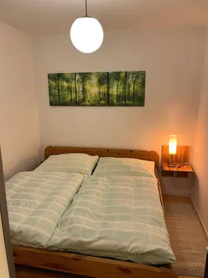 Ein Bett oder Betten in einem Zimmer der Unterkunft Wohnungen mitten im Salzkammergut