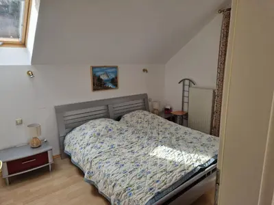 Ein Bett oder Betten in einem Zimmer der Unterkunft Apartment Traunkai Zauner Blick