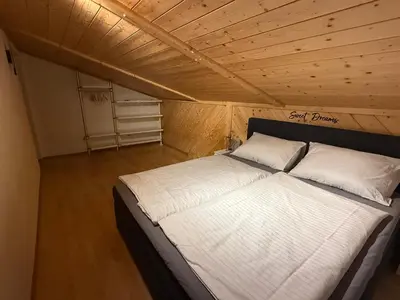 Ein Bett oder Betten in einem Zimmer der Unterkunft Hotel Bergglück