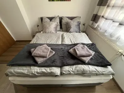 Ein Bett oder Betten in einem Zimmer der Unterkunft Ferienhaus Deutschmann Sankt Lambrecht