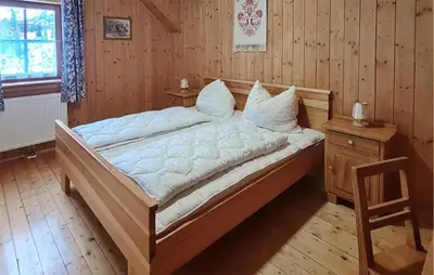 Ein Bett oder Betten in einem Zimmer der Unterkunft Ferienhuette In Lachtal