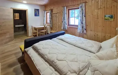 Ein Bett oder Betten in einem Zimmer der Unterkunft Ferienhuette In Lachtal