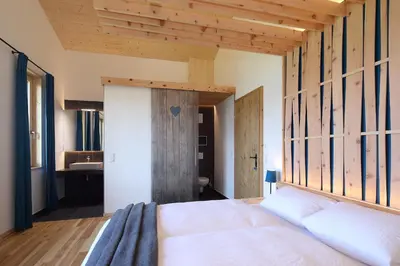 Ein Bett oder Betten in einem Zimmer der Unterkunft Chalet Alm Planai