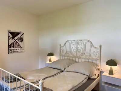 Ein Bett oder Betten in einem Zimmer der Unterkunft Bäckerhaus - Wohnung mit Pool und Garten