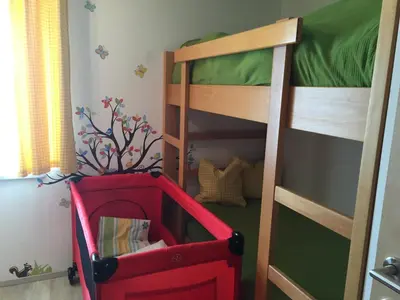 Ein Bett oder Betten in einem Zimmer der Unterkunft Ferienwohnung Nagelschmied