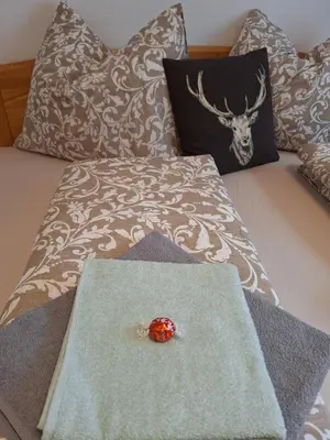 Ein Bett oder Betten in einem Zimmer der Unterkunft Appartement Bergliebe-Schneiderbauer