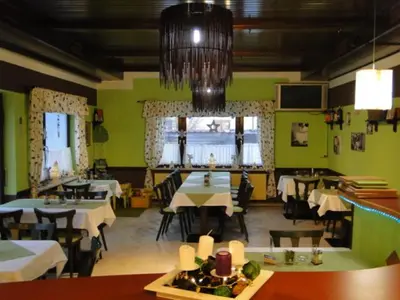 Ein Restaurant oder anderes Speiselokal in der Unterkunft Gasthof Papillon