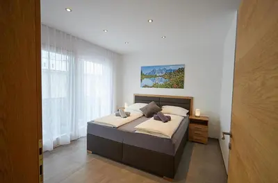 Ein Bett oder Betten in einem Zimmer der Unterkunft Apartment Lina & Lejs