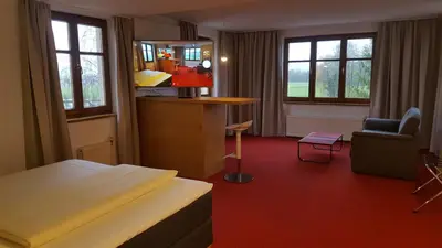 Ein Sitzbereich in der Unterkunft Hotel & Fitness Castello