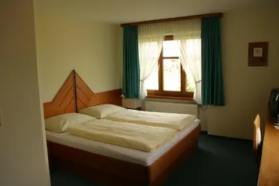 Ein Bett oder Betten in einem Zimmer der Unterkunft Hotel & Fitness Castello