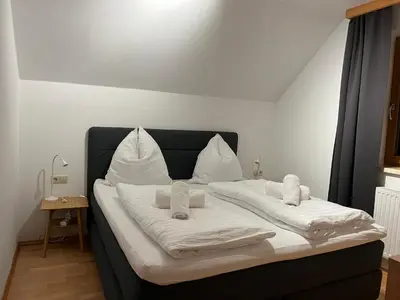 Ein Bett oder Betten in einem Zimmer der Unterkunft Bergauszeit-Gappmair