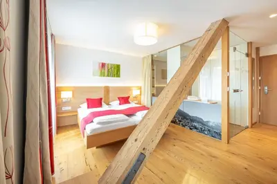 Ein Bett oder Betten in einem Zimmer der Unterkunft Hotel Loy
