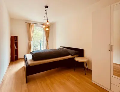 Ein Bett oder Betten in einem Zimmer der Unterkunft Hausi's Home