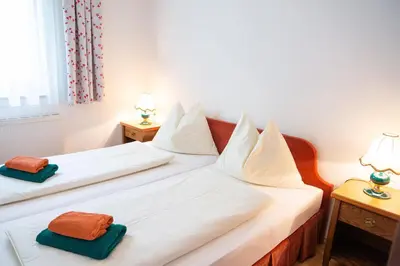 Ein Bett oder Betten in einem Zimmer der Unterkunft Seebad Appartements
