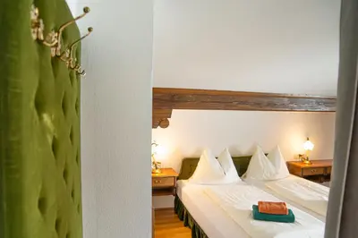 Ein Bett oder Betten in einem Zimmer der Unterkunft Seebad Appartements