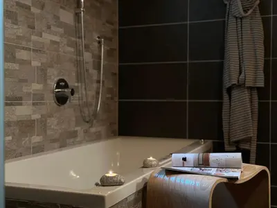 Ein Badezimmer in der Unterkunft Chalet Bischofsmütze - Direkt an der Skipiste im Skigebiet Dachstein West