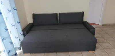 Ein Sitzbereich in der Unterkunft Claire's Apartment