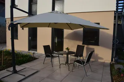 Ein Patio oder anderer Außenbereich in der Unterkunft Lenau Apartment