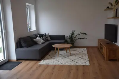 Ein Sitzbereich in der Unterkunft Lenau Apartment