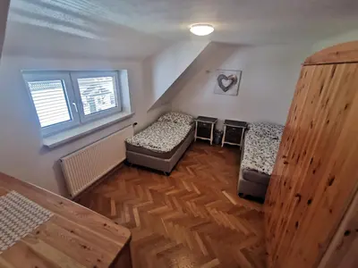 Ein Bett oder Betten in einem Zimmer der Unterkunft Ferienwohnungen Wunderburg
