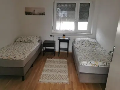 Ein Bett oder Betten in einem Zimmer der Unterkunft Ferienwohnungen Wunderburg