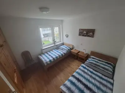 Ein Bett oder Betten in einem Zimmer der Unterkunft Ferienwohnungen Wunderburg