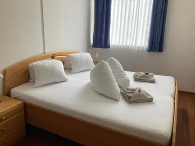 Ein Bett oder Betten in einem Zimmer der Unterkunft Apartment TAMINO TOP 2