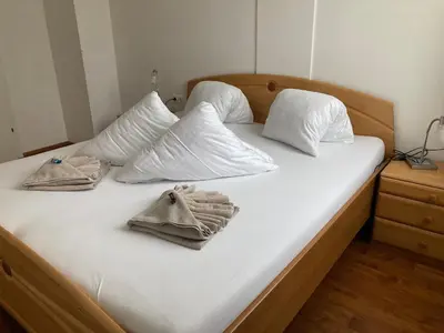 Ein Bett oder Betten in einem Zimmer der Unterkunft Apartment TAMINO TOP 2