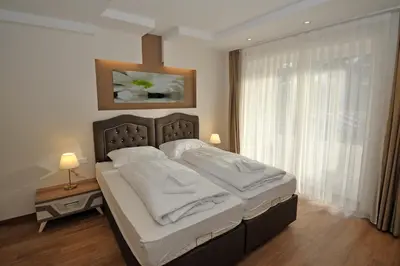Ein Bett oder Betten in einem Zimmer der Unterkunft Sunshine Apartments - Great Mountain View
