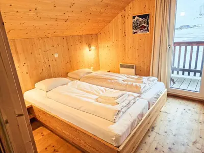 Ein Bett oder Betten in einem Zimmer der Unterkunft Kreischberg 14b