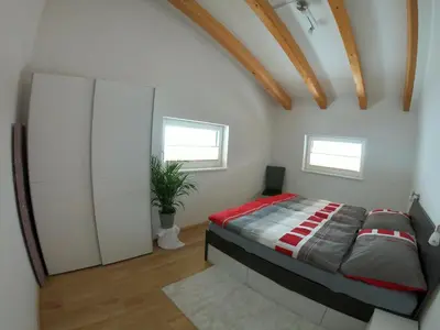 Ein Bett oder Betten in einem Zimmer der Unterkunft Arlerhof