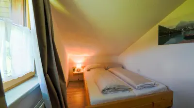 Ein Bett oder Betten in einem Zimmer der Unterkunft Haus Röthelsteinblick